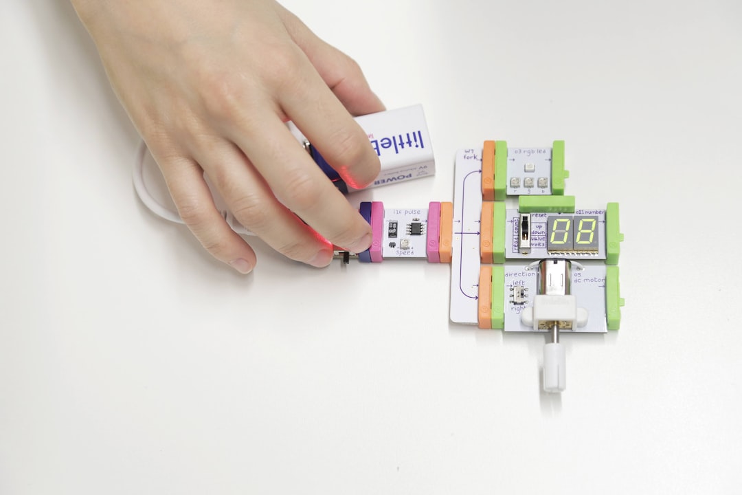 Photo by Brands&People person holding white and green cards